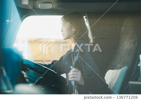 Female truck driver Female truck driver 136771209