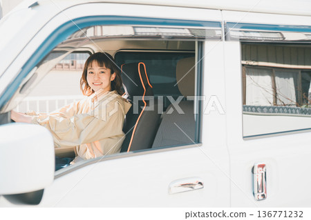 A housewife driving a light van A housewife driving a light van 136771232