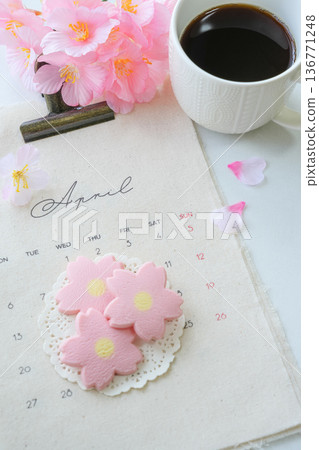 Spring image: April calendar and cherry blossom cookies 136771248