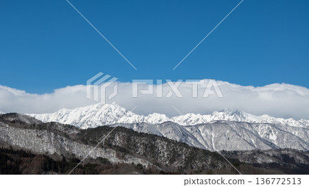 Snow clouds hanging over the ridge of the Northern Alps, Nagano Prefecture 136772513