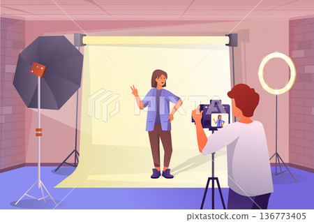 Photo studio interior concept in flat cartoon design. Woman model posing for photographer. Man with camera makes photo shooting in professional studio. Vector illustration with people scene background Photo studio interior concept in flat cartoon design. Woman model posing for photographer. Man with camera makes photo shooting in professional studio. Vector illustration with people scene background 136773405