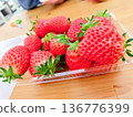 Bright red strawberries on a plate 136776399
