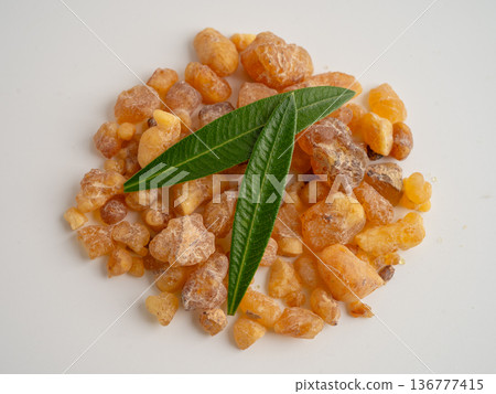Frankincense or olibanum aromatic resin isolated on white background used in incense and perfumes. 136777415