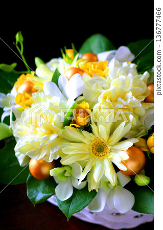 Christmas flower arrangement with glass ornaments 136777466