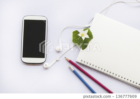 notebook, mobile phone for planner business work  136777609