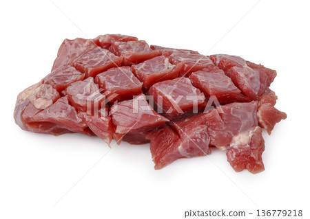 Raw beef stew meat, pre cut into lean chunks isolated on a white background Raw beef stew meat, pre cut into lean chunks isolated on a white background 136779218