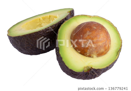 Avocado and Half of fresh avocado with kernel isolated on a white background. 136779241