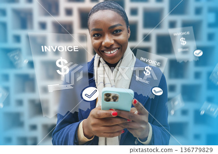 Woman making banking invoice payment on mobile phone indoors during day Woman making banking invoice payment on mobile phone indoors during day 136779829