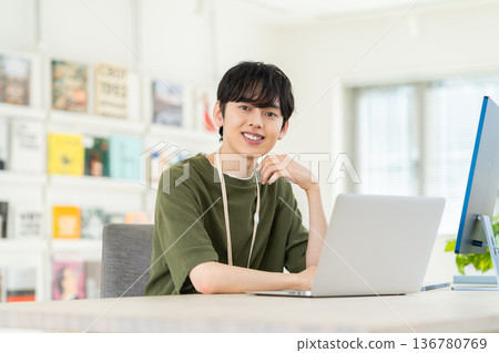 A young engineer man working in the office A young engineer man working in the office 136780769