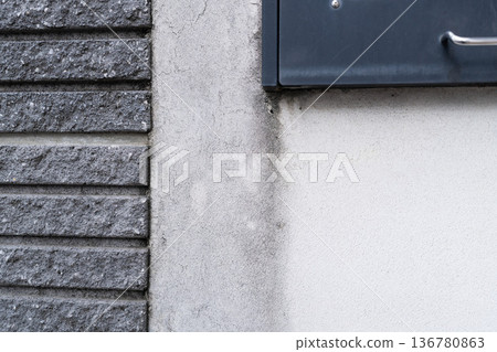 A residential gate with rain marks that needs exterior painting A residential gate with rain marks that needs exterior painting 136780863