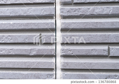 Exterior walls of houses that require repainting and caulking replacement Exterior walls of houses that require repainting and caulking replacement 136780868
