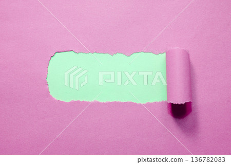 Torn Paper Reveal on Blue Background with Soft Peach Layer Torn Paper Reveal on Blue Background with Soft Peach Layer 136782083