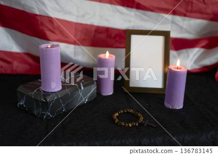funeral an American hero, photo frame, candles, marble urn for ashes, holy bible and spiritual bracelet with black cross funeral an American hero, photo frame, candles, marble urn for ashes, holy bible and spiritual bracelet with black cross 136783145
