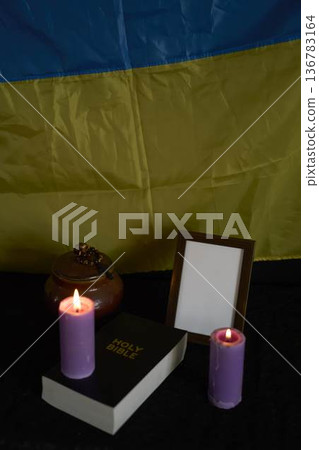 funeral of Ukrainian , photo frame, candles, marble urn for ashes, holy bible and acspiritual bracelet with black cross funeral of Ukrainian , photo frame, candles, marble urn for ashes, holy bible and acspiritual bracelet with black cross 136783164