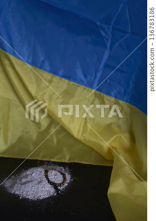 funeral of Ukrainian , a photo frame,  ashes, holy bible and spiritual bracelet with black cross 136783186