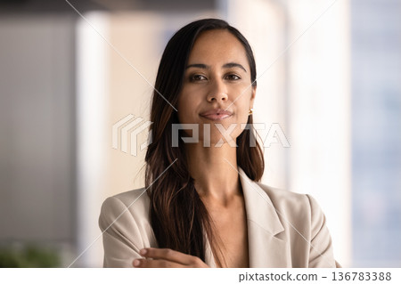 Independent New Zealand businesswoman in elegant jacket posing in office 136783388