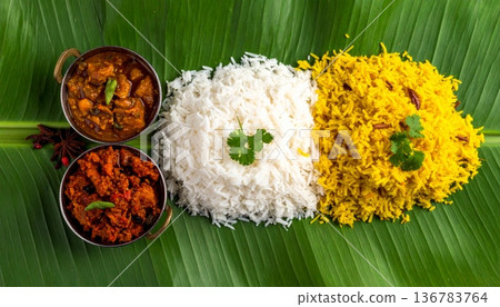 A delicious and healthy vegetarian cuisine dish featuring fresh rice with vegetables served on a plate as a nutritious lunch or dinner meal A delicious and healthy vegetarian cuisine dish featuring fresh rice with vegetables served on a plate as a nutritious lunch or dinner meal 136783764