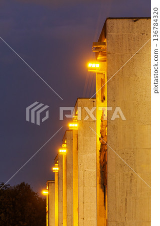 Stunning architecture illuminated in warm light during twilight at a historical site 136784320
