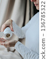 Pills and health supplements. Woman is taking supplements 136785322