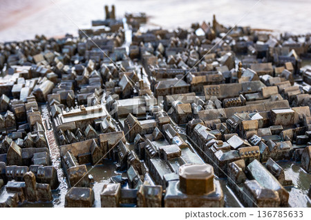 3D sculpture of the Memmingen city in Germany. The model showcases detailed buildings, streets, and landmarks, representing the city's architecture and layout. 136785633