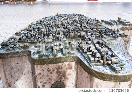 3D sculpture of the Memmingen city in Germany. The model showcases detailed buildings, streets, and landmarks, representing the city's architecture and layout. 3D sculpture of the Memmingen city in Germany. The model showcases detailed buildings, streets, and landmarks, representing the city's architecture and layout. 136785636