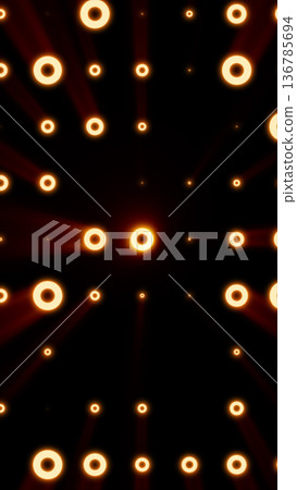 Glowing orange ring lights on black background with soft rays, abstract luminous circle pattern for futuristic tech and motion graphics 136785694