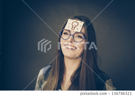 Woman thinking seeks a solution Woman thinking seeks a solution 136786321