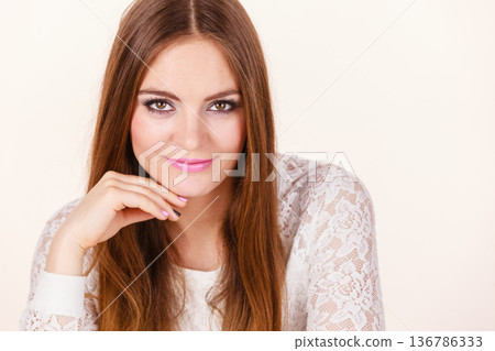 Portrait of happy, positive attractive woman Portrait of happy, positive attractive woman 136786333