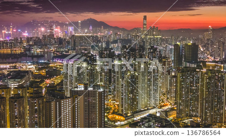 Vibrant sunset colors illuminate Kowloon dense urban skyline Feb 5 2026 Vibrant sunset colors illuminate Kowloon dense urban skyline Feb 5 2026 136786564