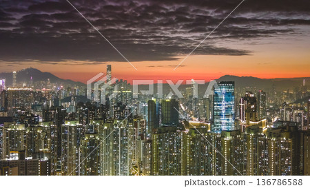 Vibrant sunset colors illuminate Kowloon dense urban skyline Feb 5 2026 Vibrant sunset colors illuminate Kowloon dense urban skyline Feb 5 2026 136786588