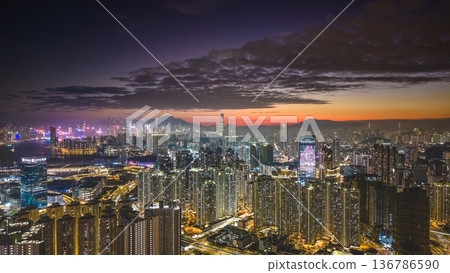 Warm sunset glow lights Kai Tak urban skyline Feb 5 2026 Warm sunset glow lights Kai Tak urban skyline Feb 5 2026 136786590