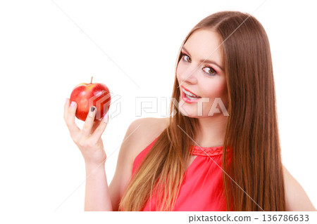 Woman charming girl colorful makeup holds apple fruit Woman charming girl colorful makeup holds apple fruit 136786633