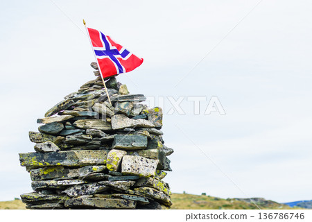 Stone stack with norwegian flag 136786746