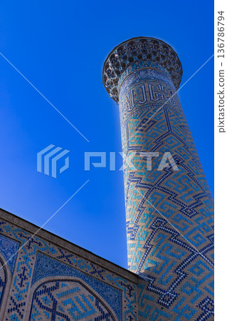 Minaret of the Registan Square Madrasah in Samarkand 136786794