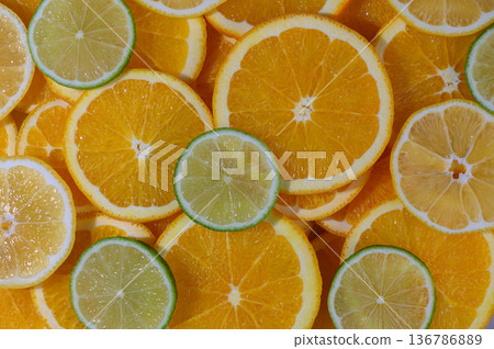 Fresh Citrus Wedges Vibrant Background 136786889
