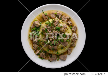Mashed Potatoes with Meat on Black Background 136786914