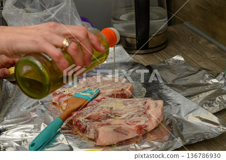 Marinating Lamb Chops or Rack with Herbs and Mustard Before Baking Marinating Lamb Chops or Rack with Herbs and Mustard Before Baking 136786930