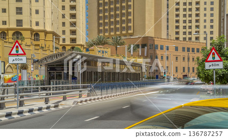 A view of traffic on the street at Jumeirah Beach Residence and Dubai marina timelapse, United Arab Emirates. A view of traffic on the street at Jumeirah Beach Residence and Dubai marina timelapse, United Arab Emirates. 136787257