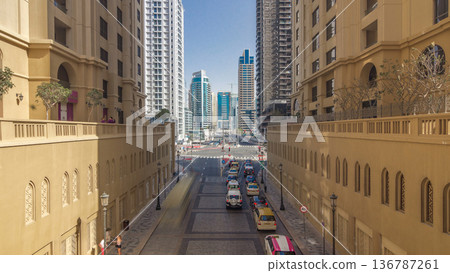 A view of traffic on the street at Jumeirah Beach Residence and Dubai marina timelapse, United Arab Emirates. A view of traffic on the street at Jumeirah Beach Residence and Dubai marina timelapse, United Arab Emirates. 136787261