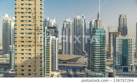 Amazing colorful dubai marina skyline during sunset timelapse Amazing colorful dubai marina skyline during sunset timelapse 136787264