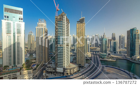 Amazing colorful dubai marina skyline during sunset timelapse 136787272