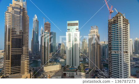 Amazing colorful dubai marina skyline during sunset timelapse Amazing colorful dubai marina skyline during sunset timelapse 136787273