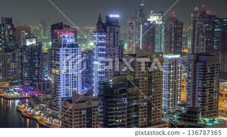 Residential towers with lighting and illumination timelapse Dubai Marina Residential towers with lighting and illumination timelapse Dubai Marina 136787365