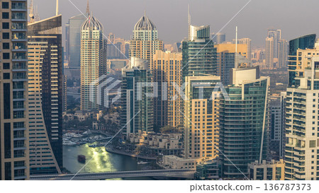 Amazing colorful dubai marina skyline during sunset timelapse Amazing colorful dubai marina skyline during sunset timelapse 136787373