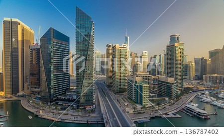 Amazing colorful dubai marina skyline during sunset timelapse Amazing colorful dubai marina skyline during sunset timelapse 136787402
