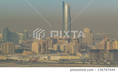 Aerial view to Festival city district timelapse includes apartments, hotels, shopping centers and entertainment places Aerial view to Festival city district timelapse includes apartments, hotels, shopping centers and entertainment places 136787444