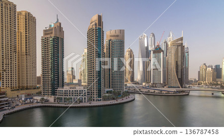 Amazing colorful dubai marina skyline during sunset timelapse Amazing colorful dubai marina skyline during sunset timelapse 136787458