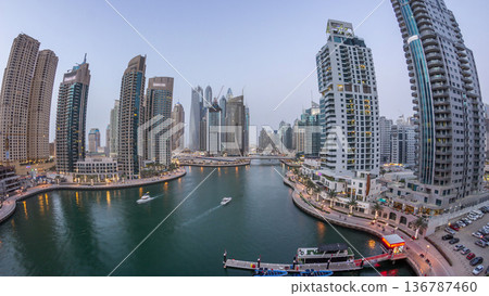 Beautiful aerial top view day to night transition timelapse of Dubai Marina canal 136787460