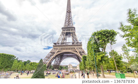 Champ de Mars and the Eiffel Tower timelapse hyperlapse in a sunny summer day. Paris, France Champ de Mars and the Eiffel Tower timelapse hyperlapse in a sunny summer day. Paris, France 136787830
