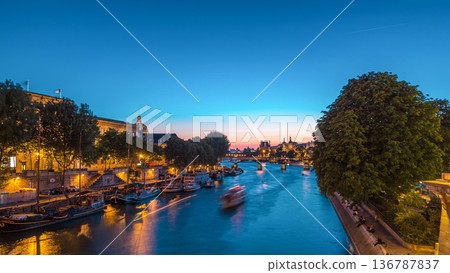 View to Pont des Arts in Paris after sunset day to night timelapse, France View to Pont des Arts in Paris after sunset day to night timelapse, France 136787837